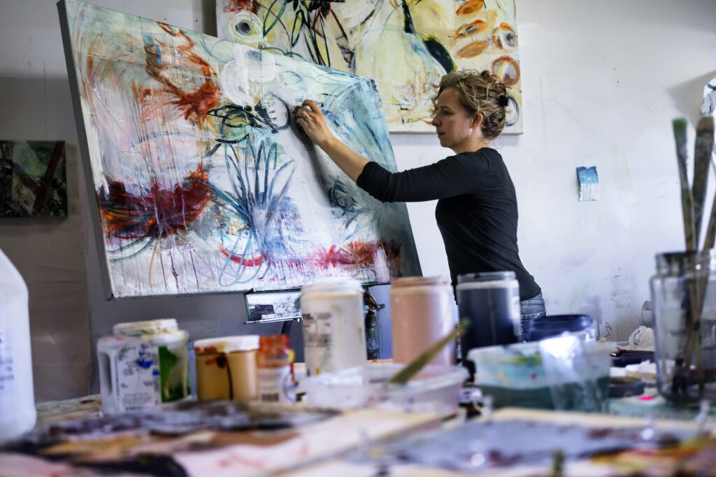 Side View Of Woman Painting